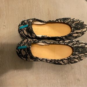 New, never worn pair of tieks in nude lace, size 10